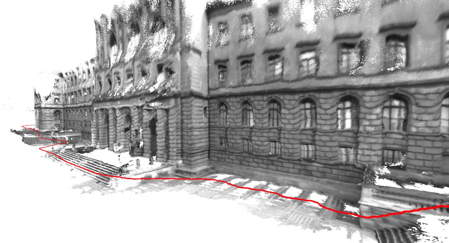 A 3D map of a building created using the ETH Zurich team's software. The red line shows where the user walked to generate the model. (Image courtesy of ETH Zurich/Thomas Schöps.)