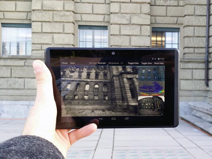 The team's software uses a Google Project Tango tablet to generate 3D models of buildings. (Image courtesy of ETH Zurich/Thomas Schöps.)